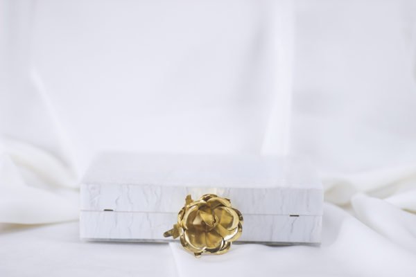 Resin pearl embellished clutch