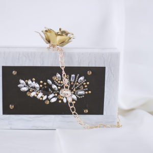 Resin pearl embellished clutch