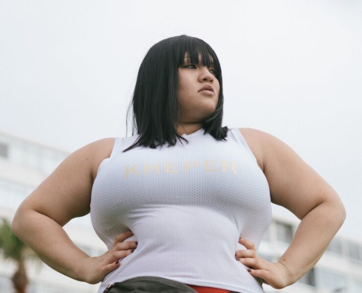 photo of woman wearing white tank top